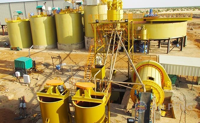 Small-scale gold processing plant with leach tanks, a ball mill and agitators